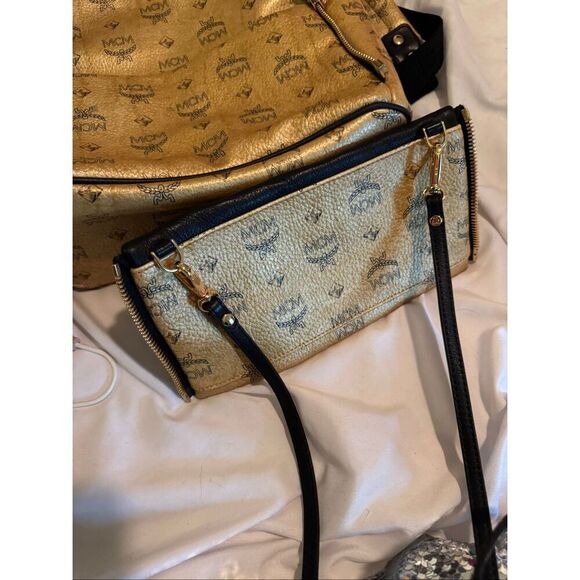 MCM Visetos Dual Stark Backpack convertible crossbody bag studded gold black